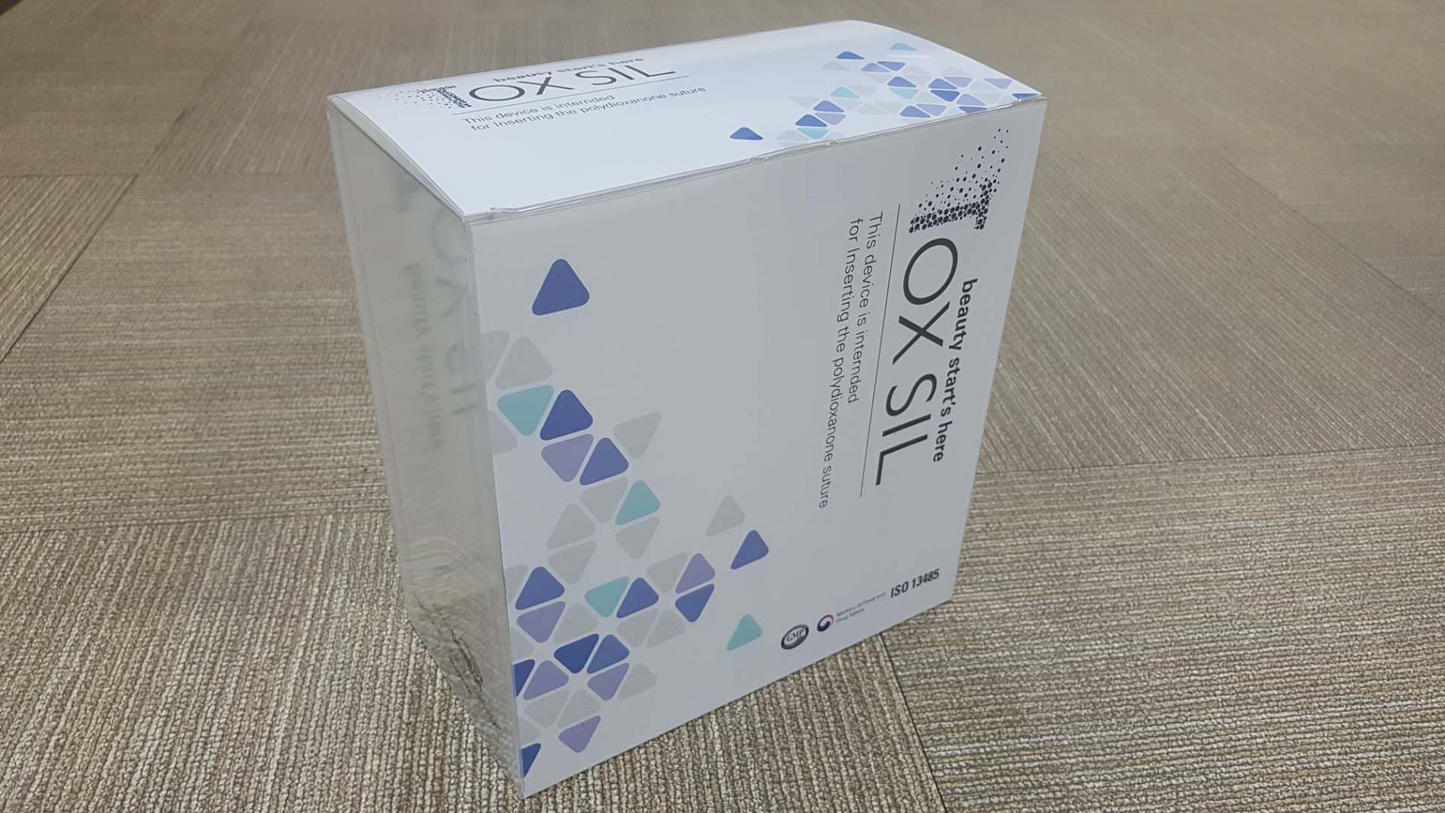 TOX SIL botox pdo-pgla product packaging on a wooden surface