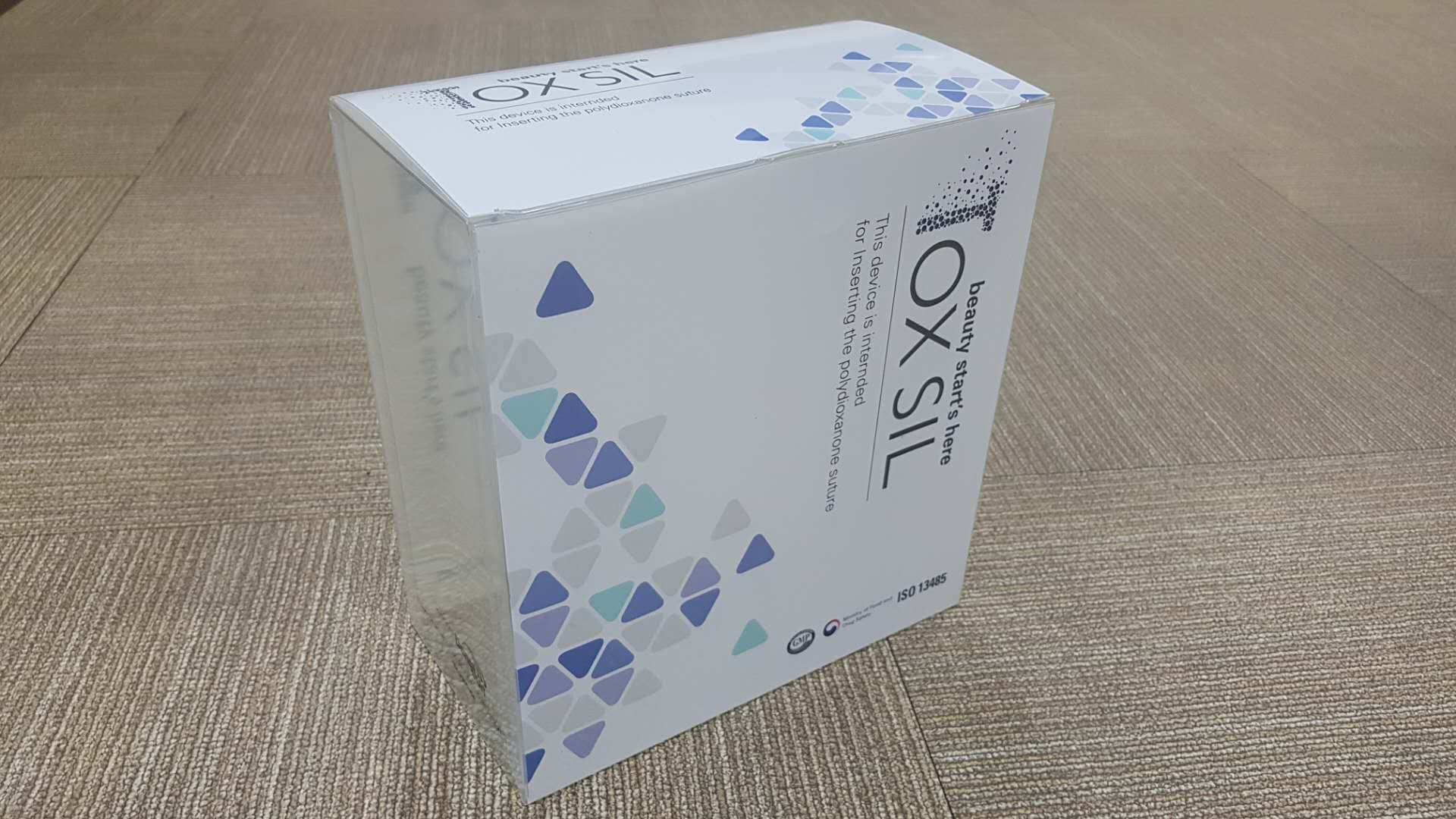 TOX SIL botox pdo-pgla product packaging on a wooden surface