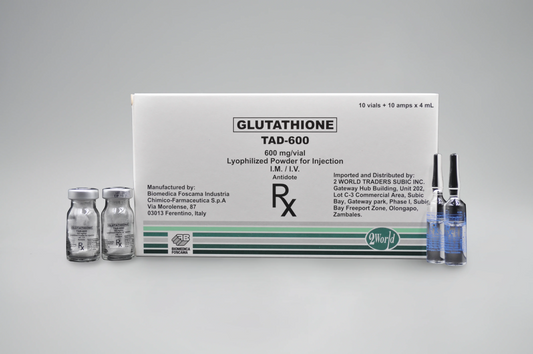A box labeled 'GLUTATHIONE TAD-600' with a prescription symbol, alongside two vials and a syringe, indicating it is a medical product for injection.